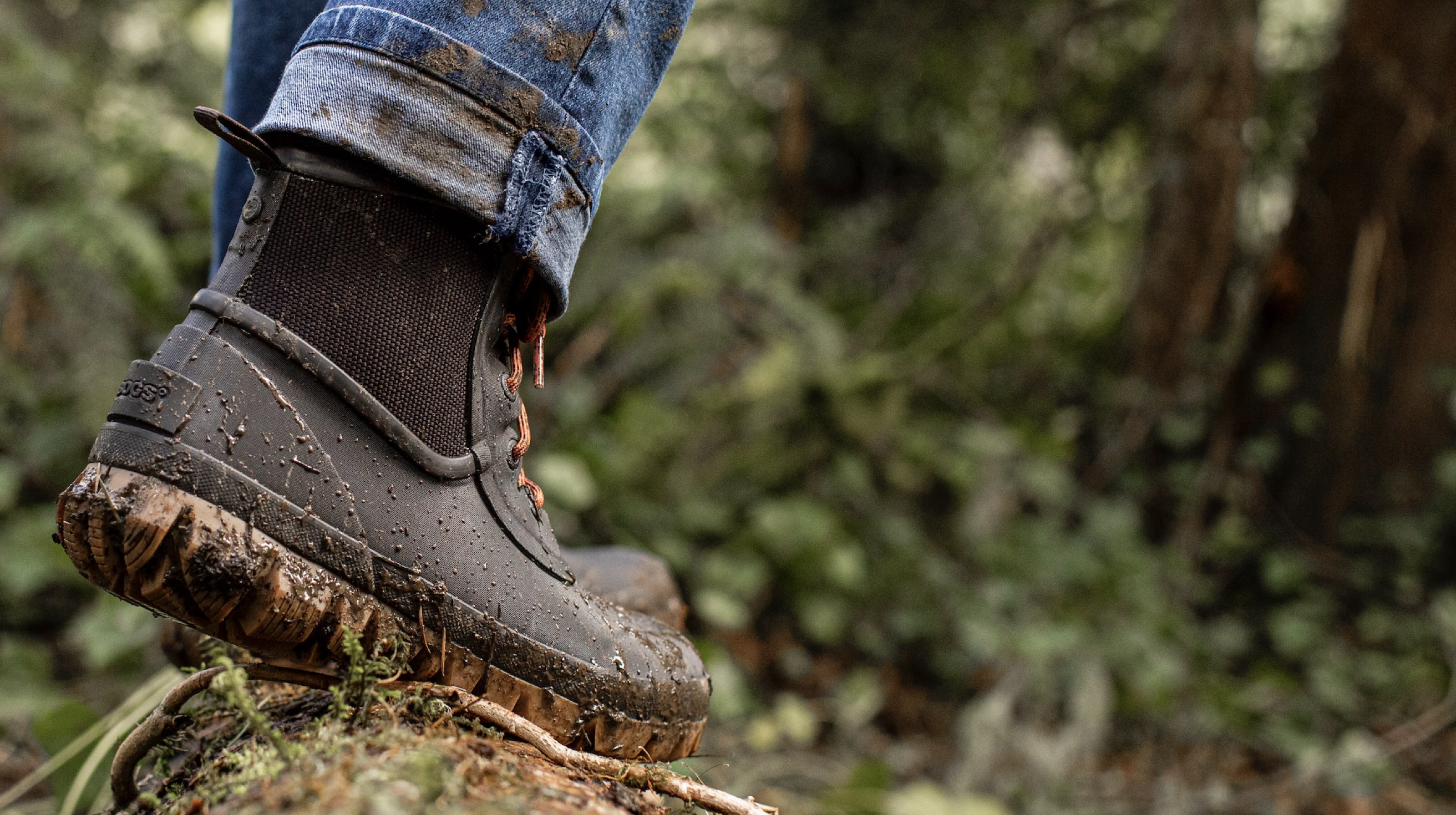 Image features the men's Arcata Urban lace up boot in the woods.