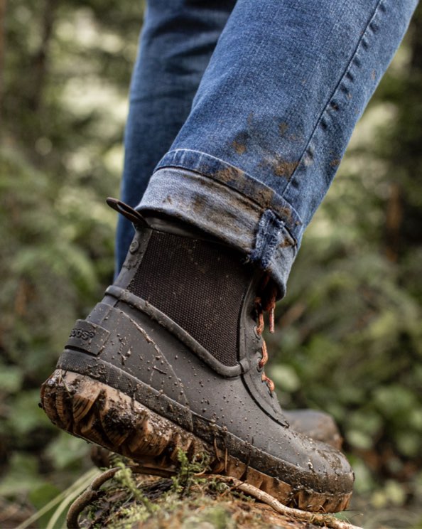 Image features the men's Arcata Urban lace up boot in the woods.