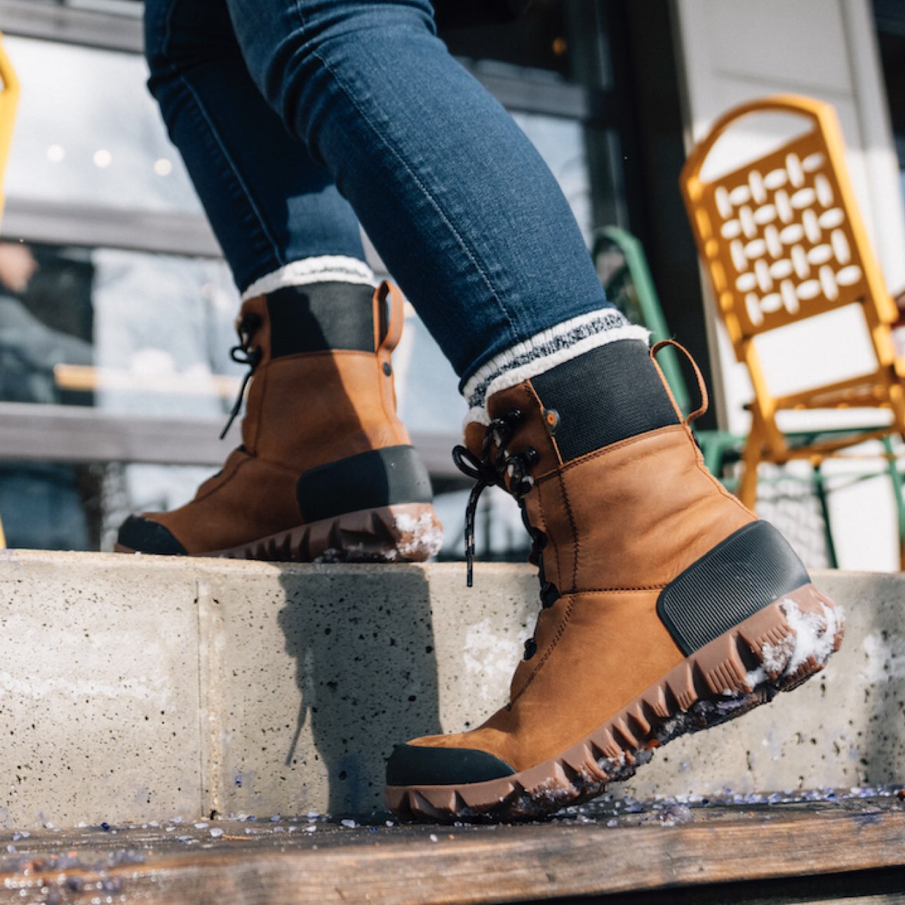 Image features the women's Arcata boot walking up slushy steps.