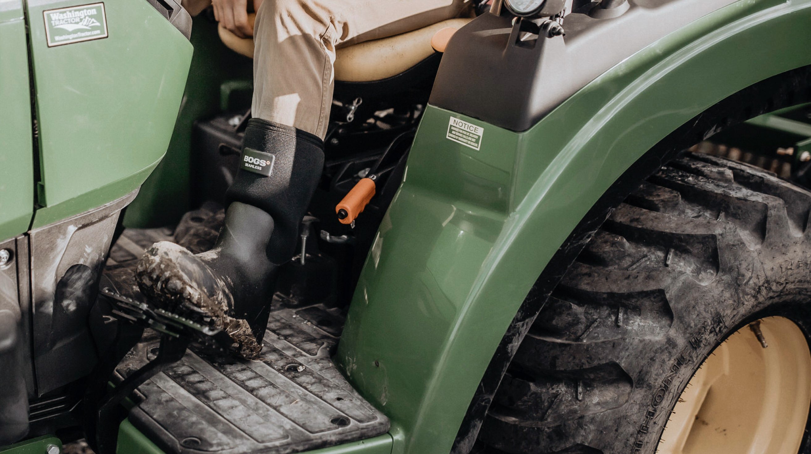 Click to shop men's Workman boots. Image features the style on a green tractor.