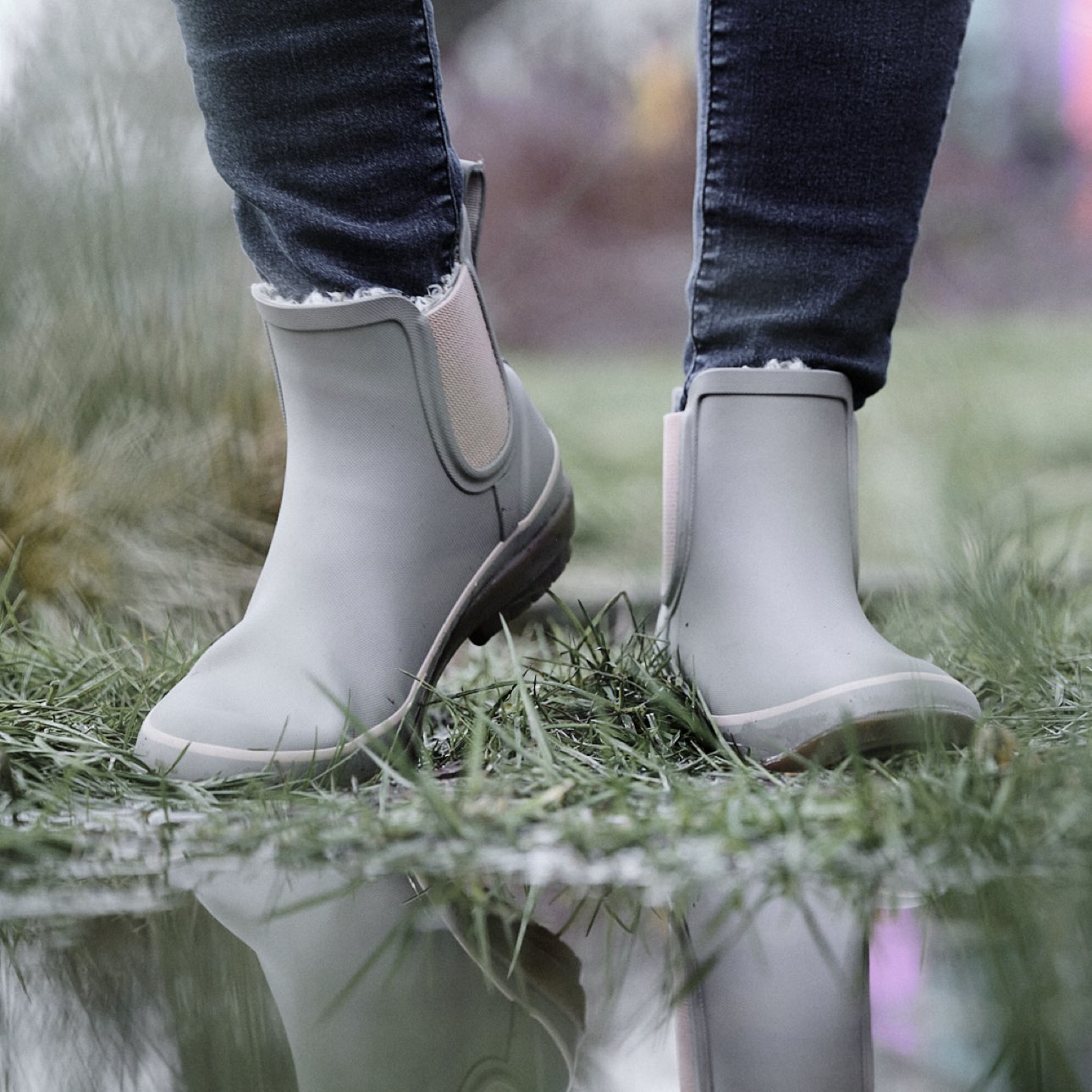 Shop our Women's Amanda II Chelsea rainboots in toffee with a gum outsole featuring the boot approaching a puddle.