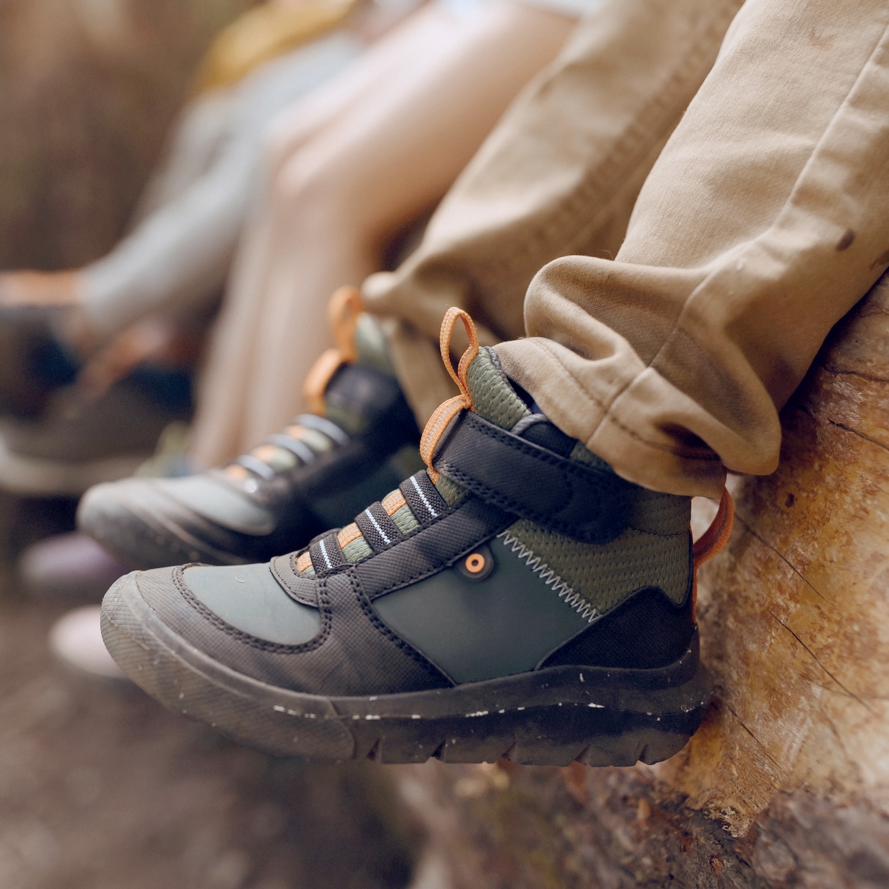 The image shown is a closeup of our kids’ skyline kicker water resistant shoe in green, blue & black with a Velcro strap. Show now.